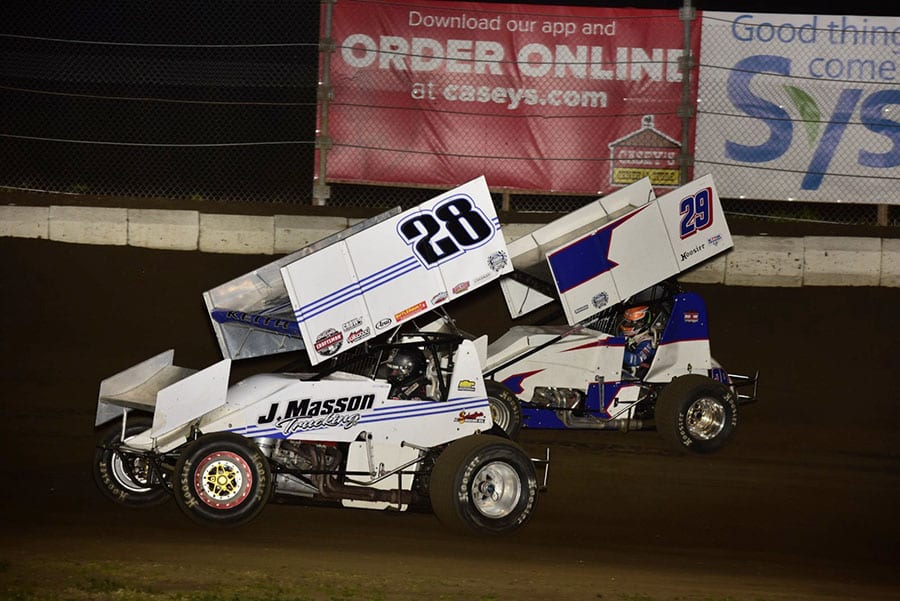 Jason Keith (28) battles Brayton Lynch during Friday's Built Ford Tough MOWA Sprint Car Series event at Jacksonville Speedway. (Mark Funderburk Photo)