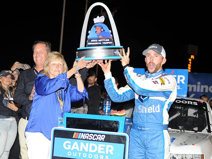 Ross Chastain celebrates in victory lane after his win Saturday at World Wide Technology Raceway. (Don Figler Photo)