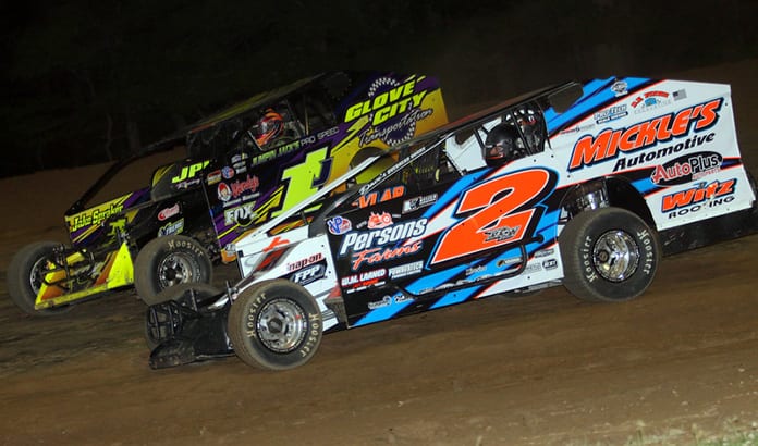 Ronnie Johnson (2) battles Rocky Warner on Friday night at Albany-Saratoga Speedway. (Dave Dalesandro Photo)