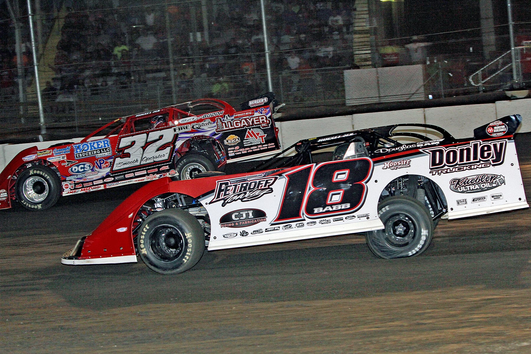 Bobby Pierce (32) battles around the outside of Shannon Babb during one of four Prairie Dirt Shootouts Friday at Fairbury Speedway. (Jim Denhamer Photo)