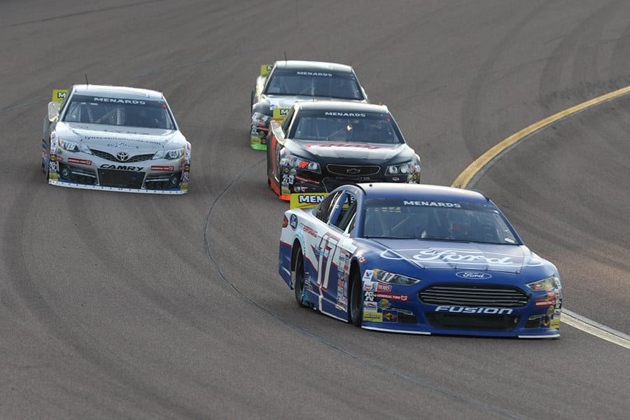 Tanner Gray (17) races ahead of a pack of cars during Friday's ARCA Menards Series race at Phoenix Raceway. (Ivan Veldhuizen Photo)