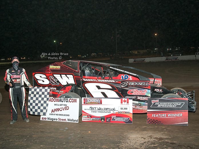 Mat Williamson in victory lane after winning the Lockdown Showdown for the DIRTcar 358 Modifieds Saturday at New Humberstone Speedway. (Alex and Helen Bruce Photo)