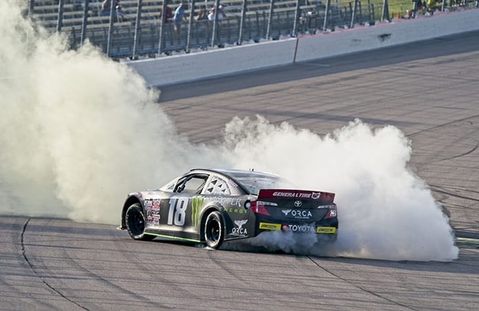 Ty Gibbs celebrates with a burnout after his victory Saturday at Iowa Speedway. (Ray Hague Photo)