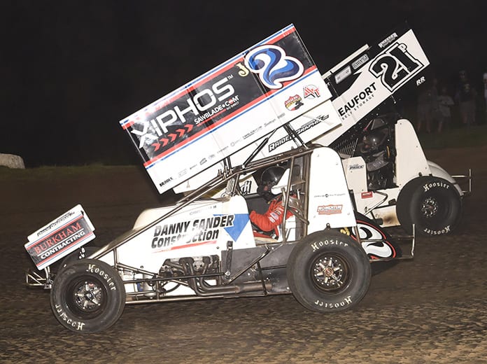 John Carney II (2) battles Robbie Price on Wednesday night at Caney Valley Speedway. (Paul Arch Photo)