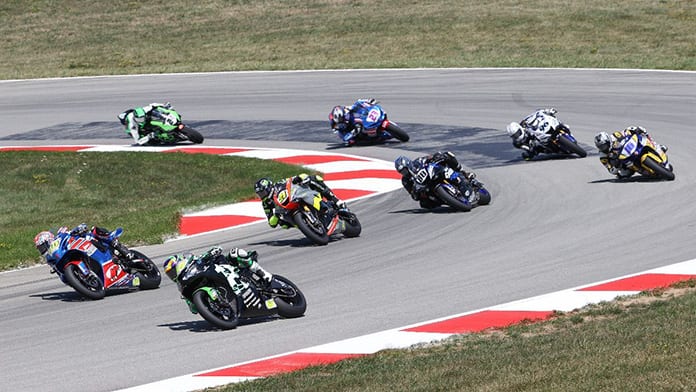 Riders battle for position during Sunday's MotoAmerica Supersport race at Pittsburgh Int'l Race Complex. (Brian J. Nelson Photo)