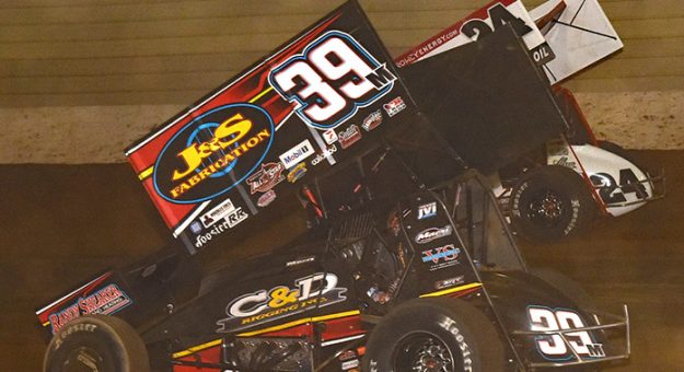 Anthony Macri (39m) makes the race-winning move on Rico Abreu Sunday night at Bedford Speedway. (Paul Arch Photo)