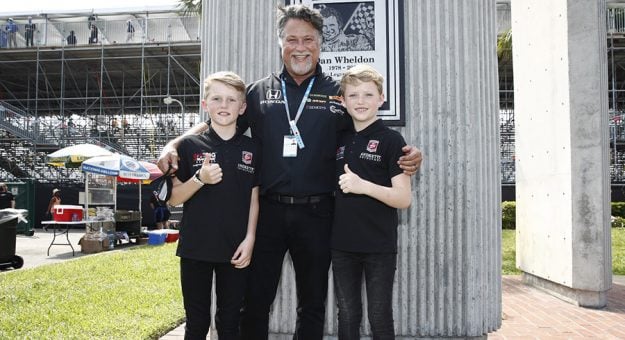 Michael Andretti (center) with Dan Wheldon's sons, Sebastian and Oliver. (IndyCar photo)