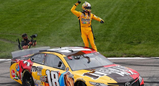 Kyle Busch celebrates winning at Kansas Speedway on Sunday. (Toyota Racing photo)