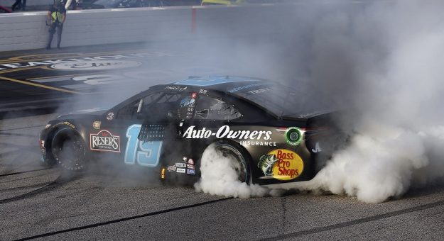 #19: Martin Truex Jr., Joe Gibbs Racing, Toyota Camry Auto-Owners Insurance celebrates his win