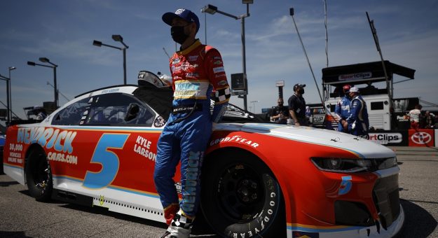 DARLINGTON, SOUTH CAROLINA - MAY 09: Kyle Larson, driver of the #5 HendrickCars.com Throwback Chevrolet, waits on the grid prior to the NASCAR Cup Series Goodyear 400 at Darlington Raceway on May 09, 2021 in Darlington, South Carolina. (Photo by Chris Graythen/Getty Images) | Getty Images