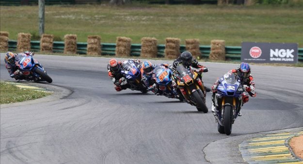 Jake Gagne (32) leads Mathew Scholtz (11), Bobby Fong (50), Josh Herrin (2) and Cameron Petersen (45) on the opening lap of the HONOS Superbike race on Saturday at VIR. (Brian J. Nelson Photo)