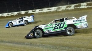 Jonathan Davenport (49) races ahead of Jimmy Owens Thursday at Eldora Speedway. (Paul Arch Photo)