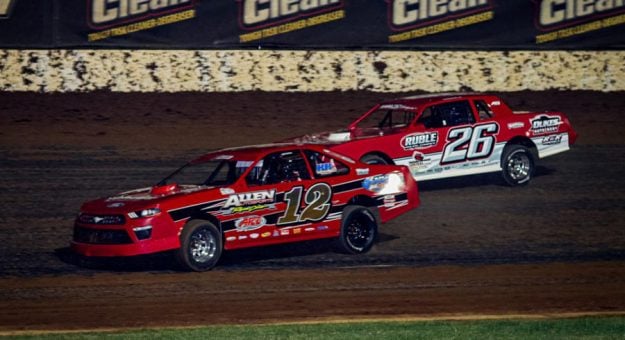 Scotty Allen (12) drove to the USRA Stock Cars feature win, headlining Saturday night's Big Adventure RV Weekly Racing Series Midseason Championship program at Lucas Oil Speedway. (GS Stanek Racing Photography)