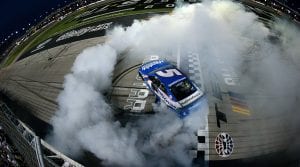 Kyle Larson celebrates with a burnout after his victory in the NASCAR All-Star Race. (Sean Gardner/Getty Images Photo)