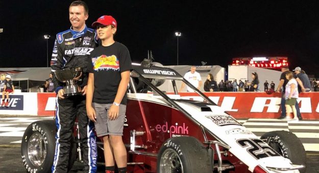 Kody Swanson (Kingsburg, Calif.) and his victory lane guest, Charlie Leffler.