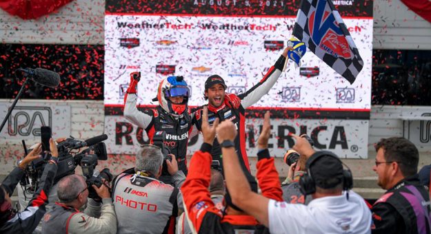 Dane Cameron and Pipo Derani celebrate Sunday at Road America. (IMSA Photo)