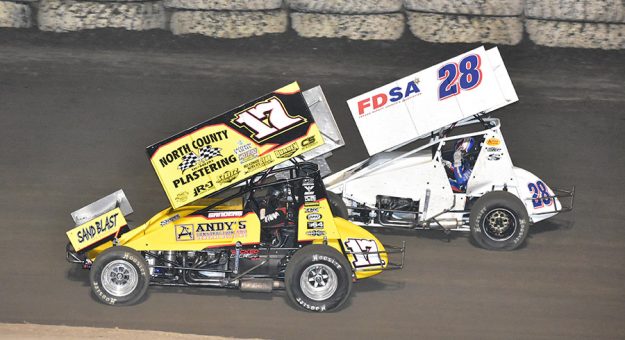 Justin Sanders (17) and Chase Johnson battle early in Friday's Taco Bravo 360 Sprint Car Series feature at Ocean Speedway. (Joe Shivak Photo)