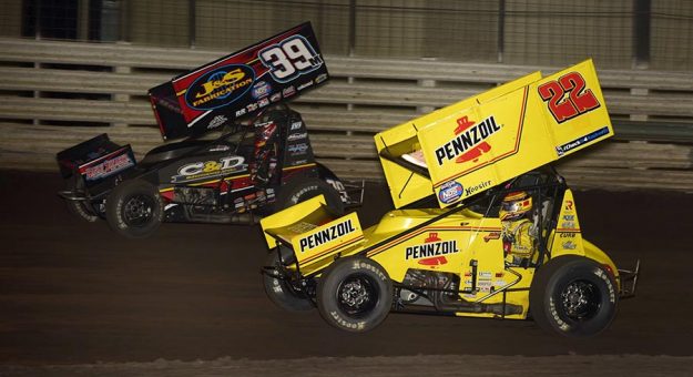 Anthony Macri (39) battles Jac Haudenschild during the Hard Knox feature Friday night at Knoxville Raceway. (Mark Funderburk Photo)