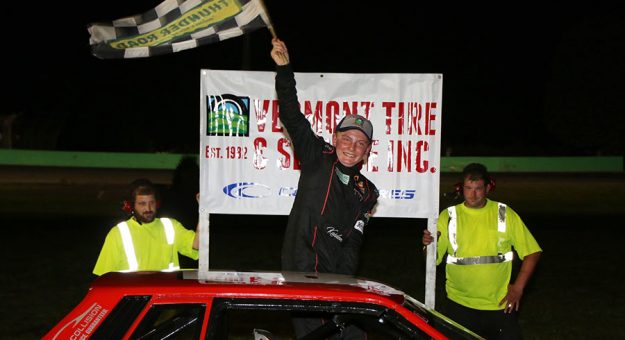 Kaiden Fisher was all smiles after winning his second straight RK Miles Street Stock Special on Vermont Tire & Service Night. (Alan Ward photo)