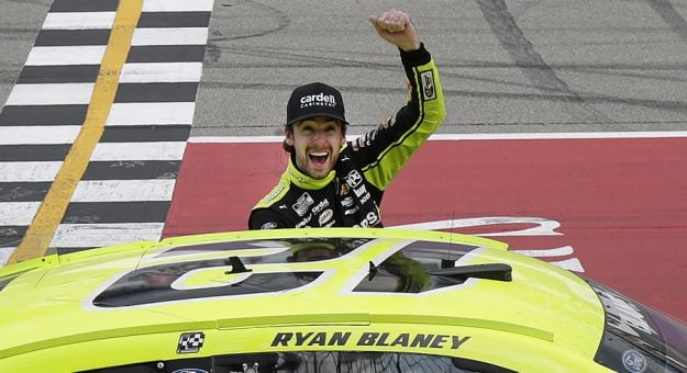 August 22, 2021 - Ryan Blaney celebrates after winning the FireKeepers Casino 400 at Michigan International Speedway . (HHP/Garry Eller)