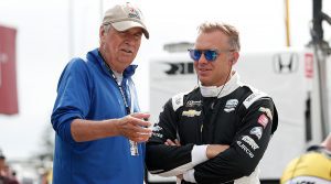 Robin MIller (left) talks with Ed Carpenter. (IndyCar Photo)