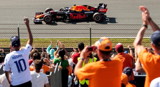 Fans celebrate after Max Verstappen claimed the pole for the Dutch Grand Prix. (Boris Streubel/Getty Images Photo)