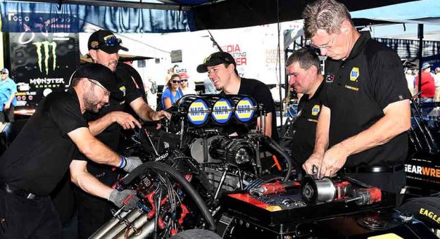 The NAPA Funny Car team hard at work. (Kent Steele Photo)