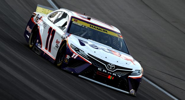 Denny Hamlin on his way to victory Sunday at Las Vegas Motor Speedway. (Meg Oliphant/Getty Images Photo)