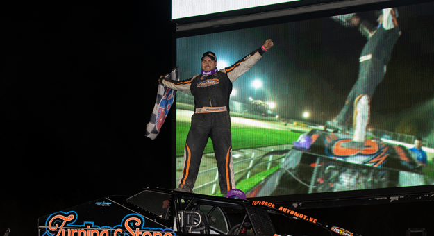 Chris Mackey in victory lane at Weedsport Speedway. (Quentin Young Photo)