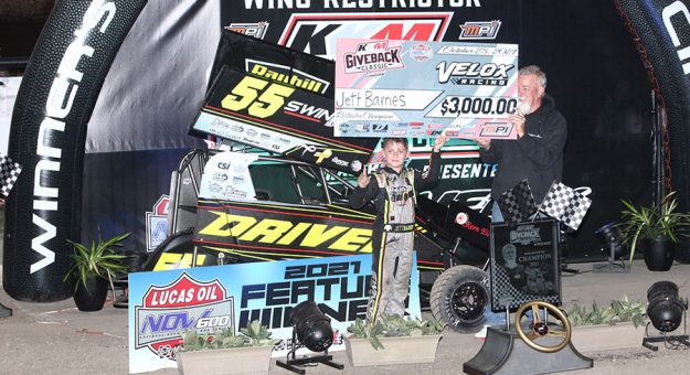 Jett Barnes in victory lane Saturday at Port City Raceway. (Richard Bales Photo)