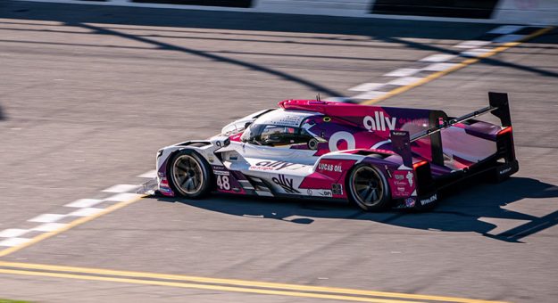 Kamui Kobayashi had the No. 48 Ally Cadillac DPi at the front of the Rolex 24 field after eight hours. (Jason Reasin Photo)