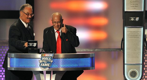 Franklin Scott (left) and Wendell Scott Jr. (right), sons of NASCAR Hall of Famer Wendell Scott, speak during the 2015 NASCAR Hall of Fame Induction Ceremony. )Lance King/Getty Images Photo)