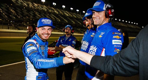 Kyle Larson receives congratulations after winning the pole for the Daytona 500. (HHP/Chris Owens Photo)