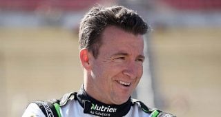 FONTANA, CALIFORNIA - FEBRUARY 26: AJ Allmendinger, driver of the #16 Nutrien Ag Solutions Chevrolet, talks on the grid during qualifying for the NASCAR Xfinity Series Production Alliance 300 at Auto Club Speedway on February 26, 2022 in Fontana, California. (Photo by James Gilbert/Getty Images) | Getty Images