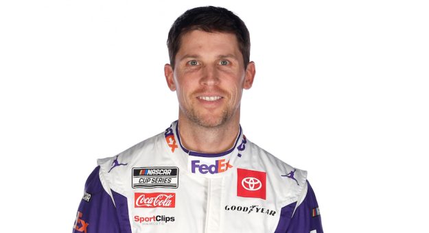 CONCORD, NORTH CAROLINA - JANUARY 18: NASCAR driver Denny Hamlin poses for a photo during NASCAR Production Days at Clutch Studios on January 18, 2022 in Concord, North Carolina. (Photo by Chris Graythen/Getty Images) | Getty Images