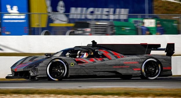 Visit Sims Slides Into Cadillac GTP Seat page