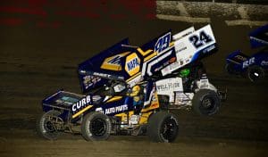 Brad Sweet (49) battles with Rico Abreu at East Bay Raceway Park.