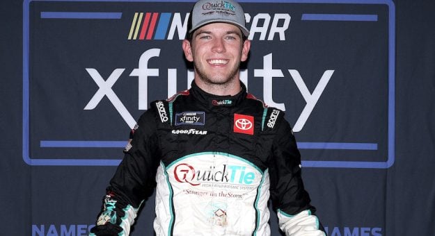 DAYTONA BEACH, FLORIDA - AUGUST 23: Chandler Smith, driver of the #81 QuickTie Toyota, poses for photos after winning the pole award during qualifying for the NASCAR Xfinity Series Wawa 250 Powered by Coca-Cola at Daytona International Speedway on August 23, 2024 in Daytona Beach, Florida. (Photo by James Gilbert/Getty Images)