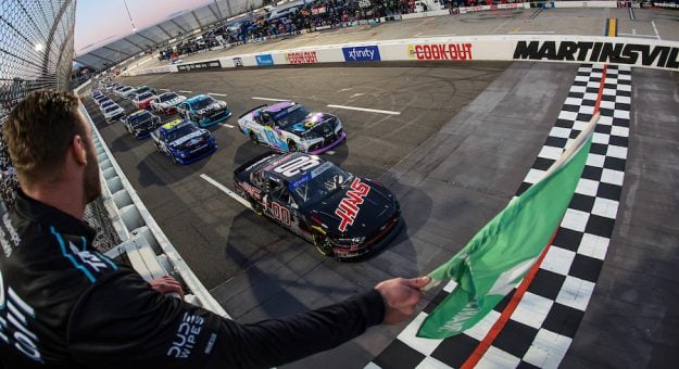 MARTINSVILLE, VIRGINIA - APRIL 06: Cole Custer, driver of the #00 Haas Automation Ford, leads the field to the green flag to start the NASCAR Xfinity Series DUDE Wipes 250 at Martinsville Speedway on April 06, 2024 in Martinsville, Virginia. (Photo by James Gilbert/Getty Images)