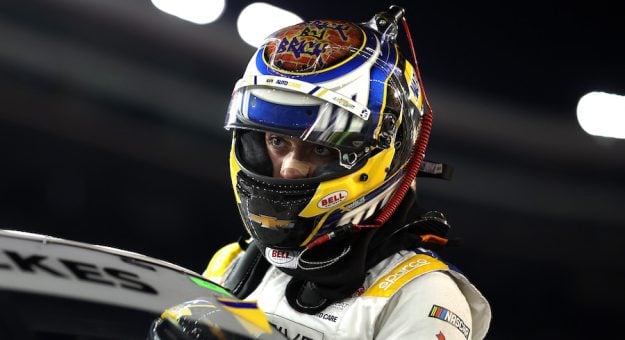 BRISTOL, TENNESSEE - SEPTEMBER 19: Christian Eckes, driver of the #19 Adaptive One Calipers Chevrolet, enters his truck for the NASCAR Craftsman Truck Series UNOH 200 presented by Ohio Logistics at Bristol Motor Speedway on September 19, 2024 in Bristol, Tennessee. (Photo by James Gilbert/Getty Images)